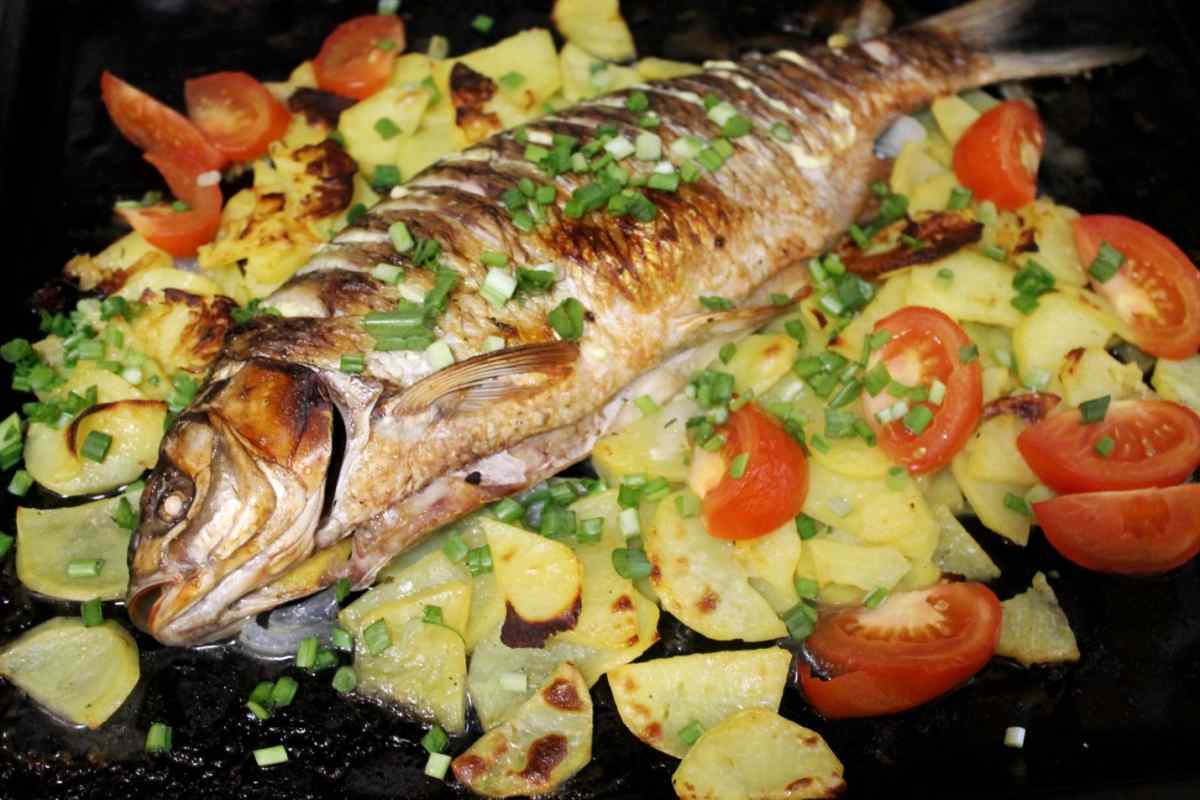 Як приготувати рибу в духовці: рецепти